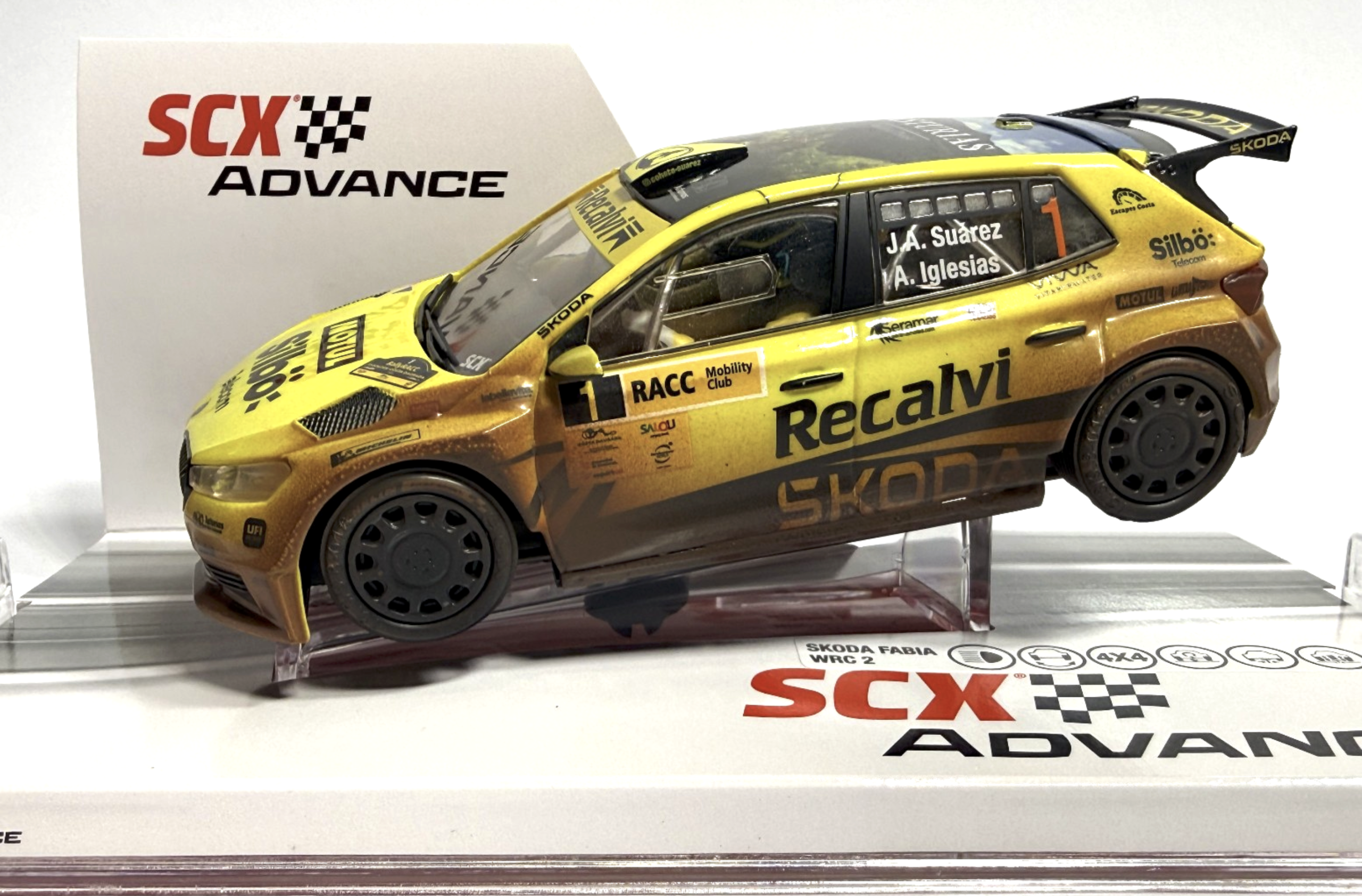 SCX Classic U10565 - Mud Effect Škoda Fabia RS Rally2 #5 Recalvi Team Spanish Super Rally 2023 Four-Wheel Drive